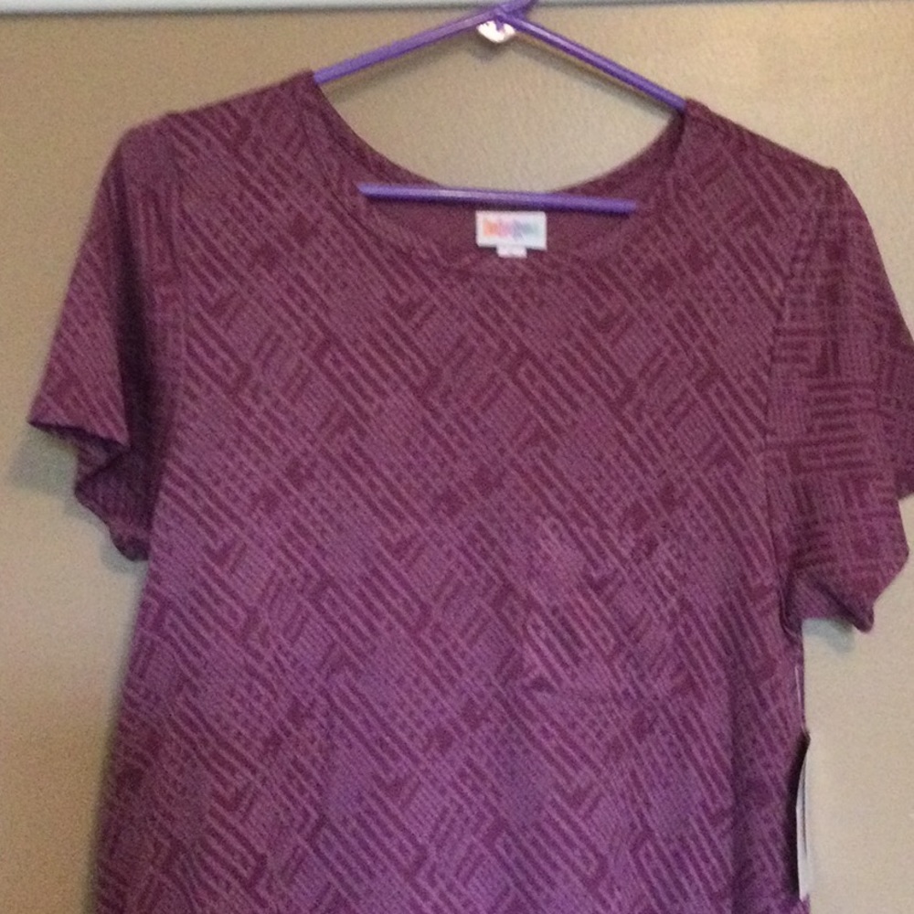 New with tags Lularoe Carly Dress, size Small. Dusty rose/pink color
